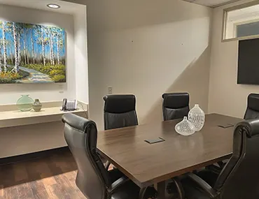 Executech Offices in Hillsboro and Portland Airport Boardroom 1 with Large Table and Three Chairs